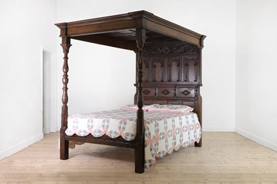 Lot 351 - A carved oak three-quarter tester bed