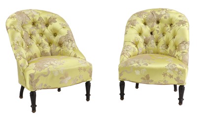Lot 310 - A pair of upholstered low chairs