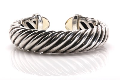 Lot 217 - A sterling silver diamond and citrine set hinged torque bangle, by David Yurman