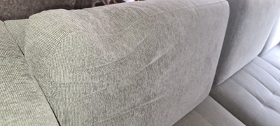 Lot 607 - A BoConcept grey upholstered sofa and footstool