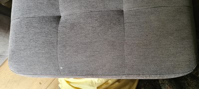 Lot 607 - A BoConcept grey upholstered sofa and footstool