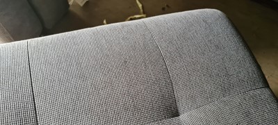 Lot 607 - A BoConcept grey upholstered sofa and footstool