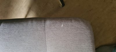 Lot 607 - A BoConcept grey upholstered sofa and footstool