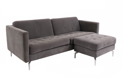 Lot 606 - A BoConcept grey upholstered sofa and footstool