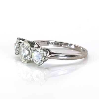 Lot 99 - An 18ct white gold graduated three stone diamond ring