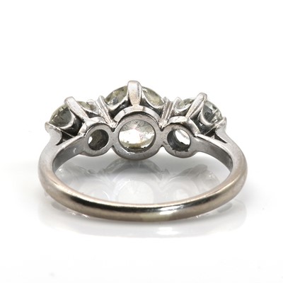 Lot 99 - An 18ct white gold graduated three stone diamond ring