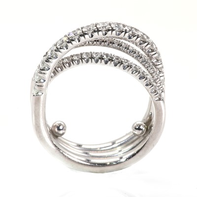 Lot 134 - An 18ct white gold 'Étincelle' three row diamond half eternity ring, by Cartier