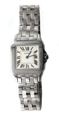 Lot 311 - A ladies' stainless steel Cartier Santos Demoiselle quartz bracelet watch