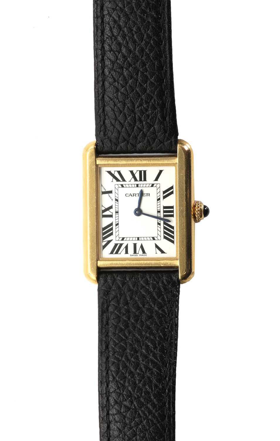 Lot 313 - A ladies' gold and stainless steel Cartier Tank Solo quartz strap watch