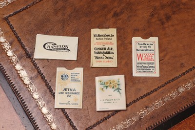 Lot 158 - A group of four American advertising celluloid stamp books