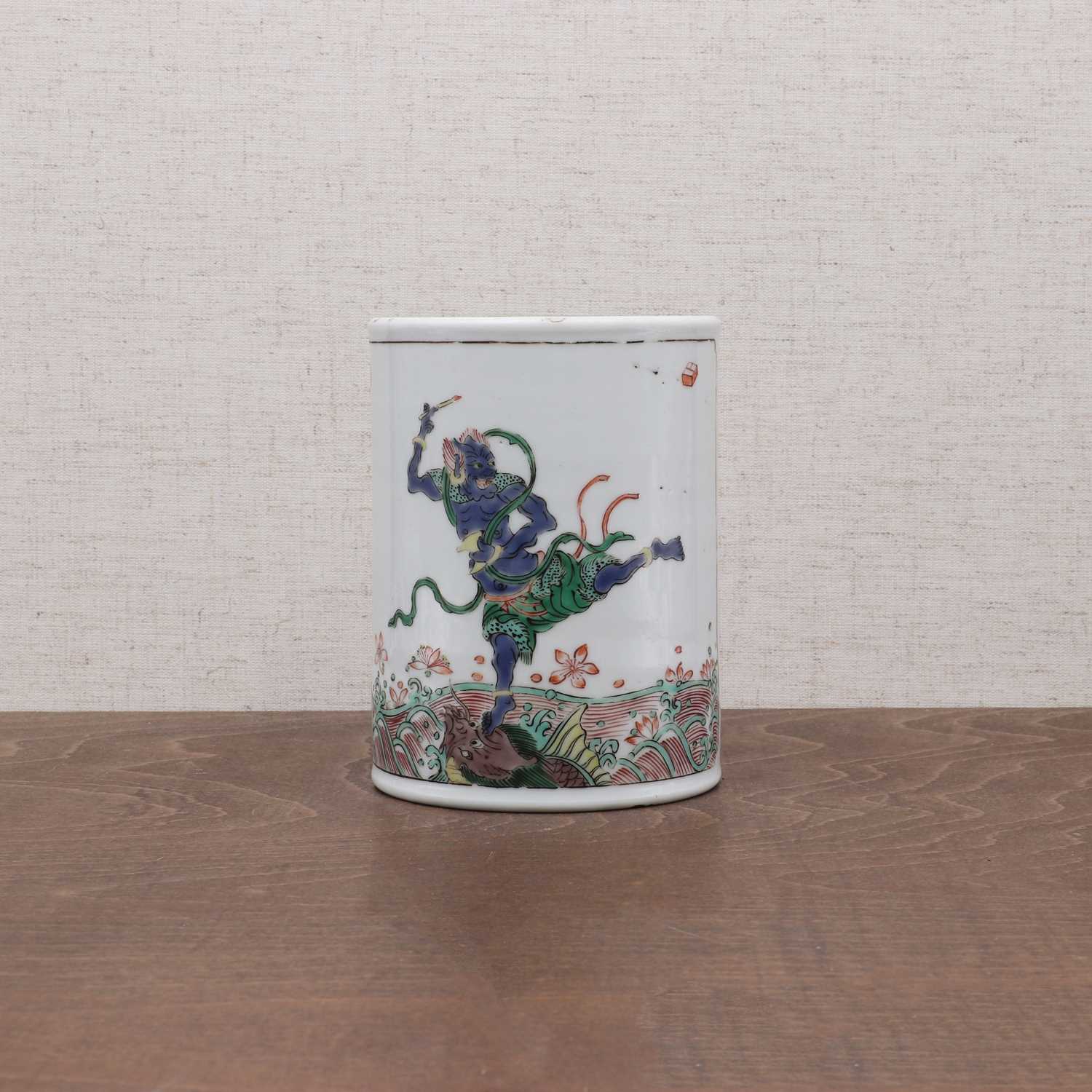Lot 57 - A Chinese wucai brush pot