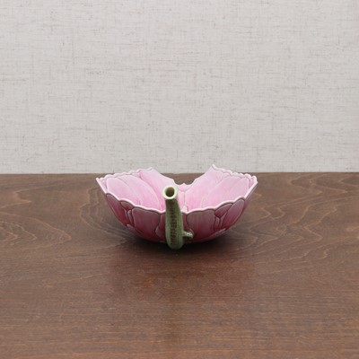 Lot 124 - A Chinese famille rose lotus cup
