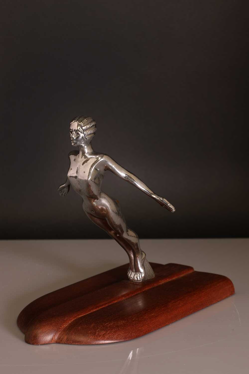 Lot 205 - An Art Deco 'Desmo' cast and chrome car mascot