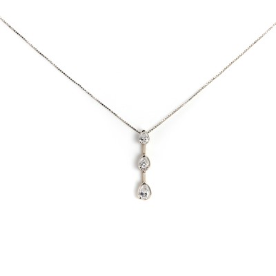 Lot 1075 - A three stone pear cut diamond pendant on chain
