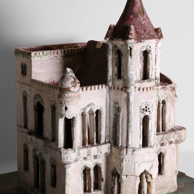 Lot 267 - A folk art plaster model of a house
