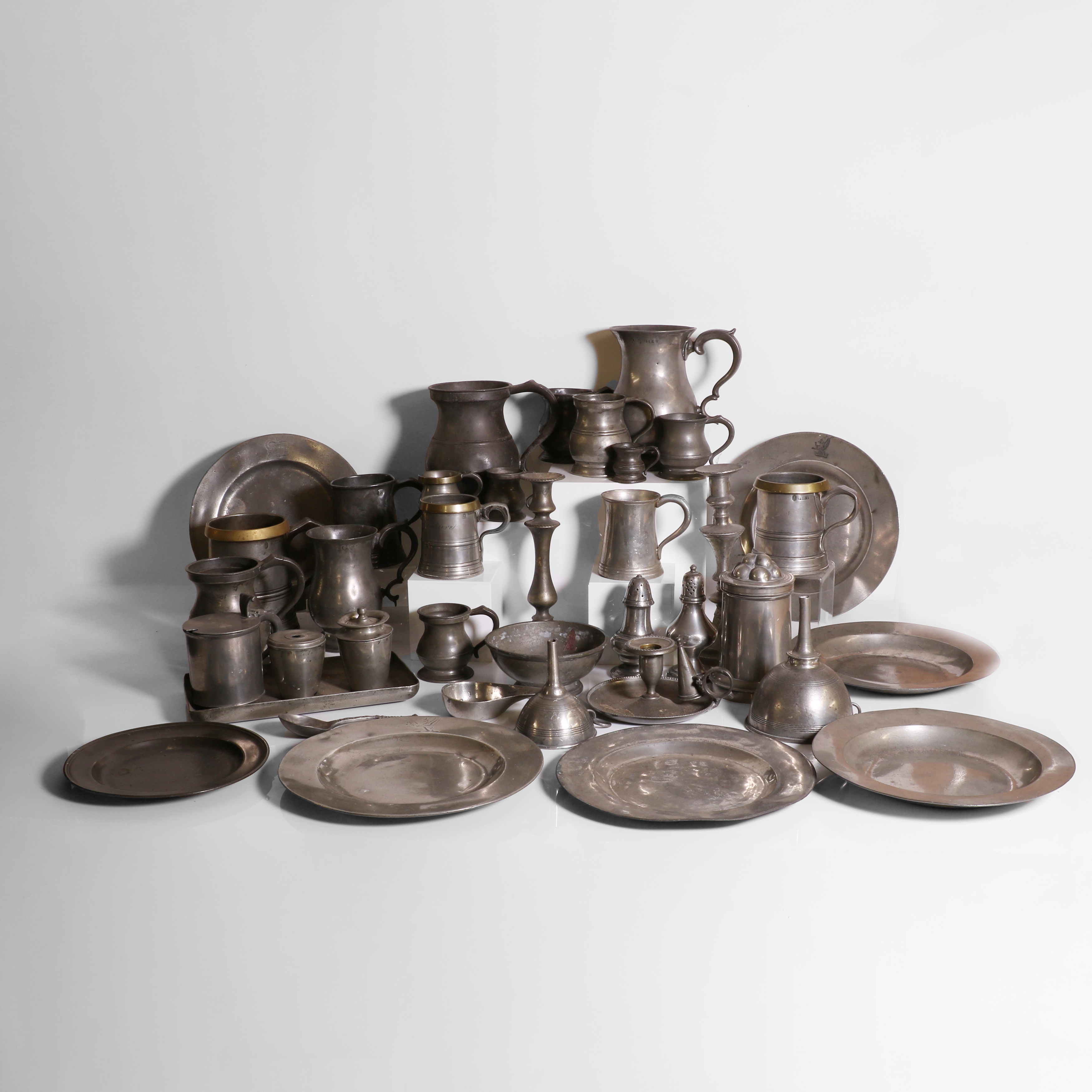 Lot 89 A large collection of pewter items,