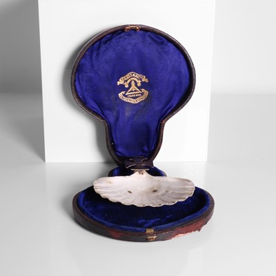 Lot 23 - A silver-mounted christening shell