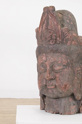 Lot 177 - A carved and painted wooden head of Buddha