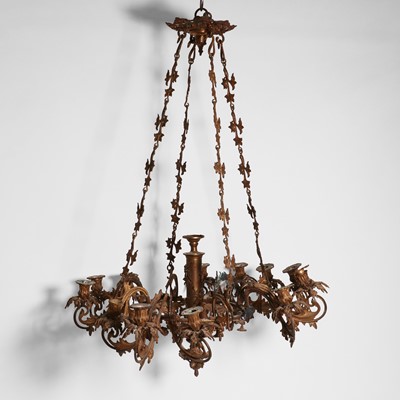 Lot 87 - A gilt-metal twelve-light chandelier