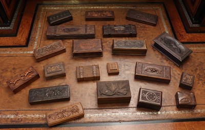 Lot 133 - A group of carved wood stamp boxes