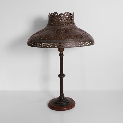 Lot 146 - A Cairo ware pierced brass lamp