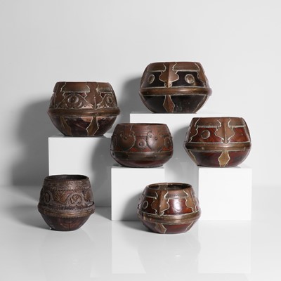 Lot 133 - A group of seven rice measures or Kunke