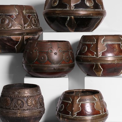 Lot 133 - A group of seven rice measures or Kunke