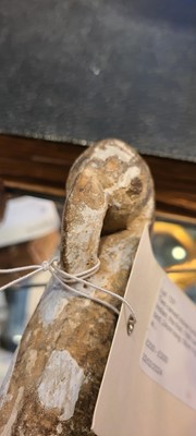 Lot 137 - Two carved stone turban hooks