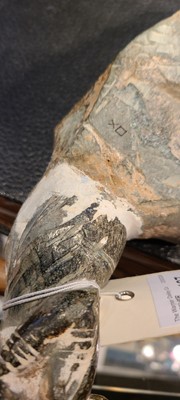 Lot 137 - Two carved stone turban hooks