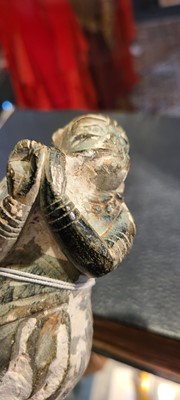 Lot 137 - Two carved stone turban hooks