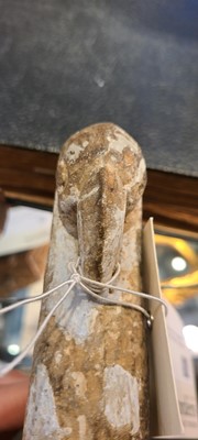 Lot 137 - Two carved stone turban hooks