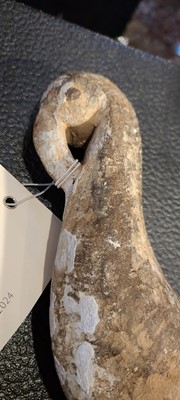 Lot 137 - Two carved stone turban hooks