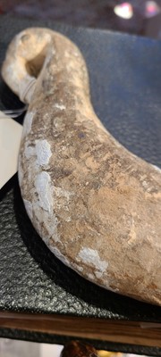 Lot 137 - Two carved stone turban hooks