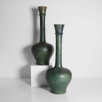 Lot 92 - A pair of glazed earthenware vases