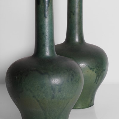 Lot 92 - A pair of glazed earthenware vases