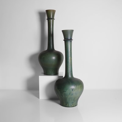 Lot 92 - A pair of glazed earthenware vases