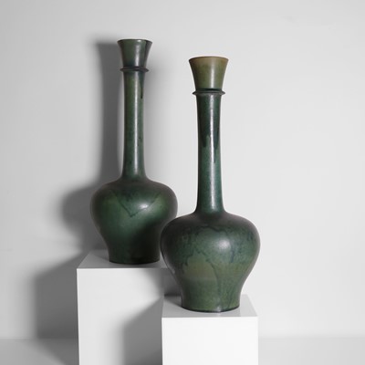 Lot 92 - A pair of glazed earthenware vases