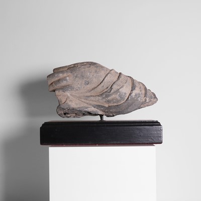 Lot 141 - A schist stone carving of a hand