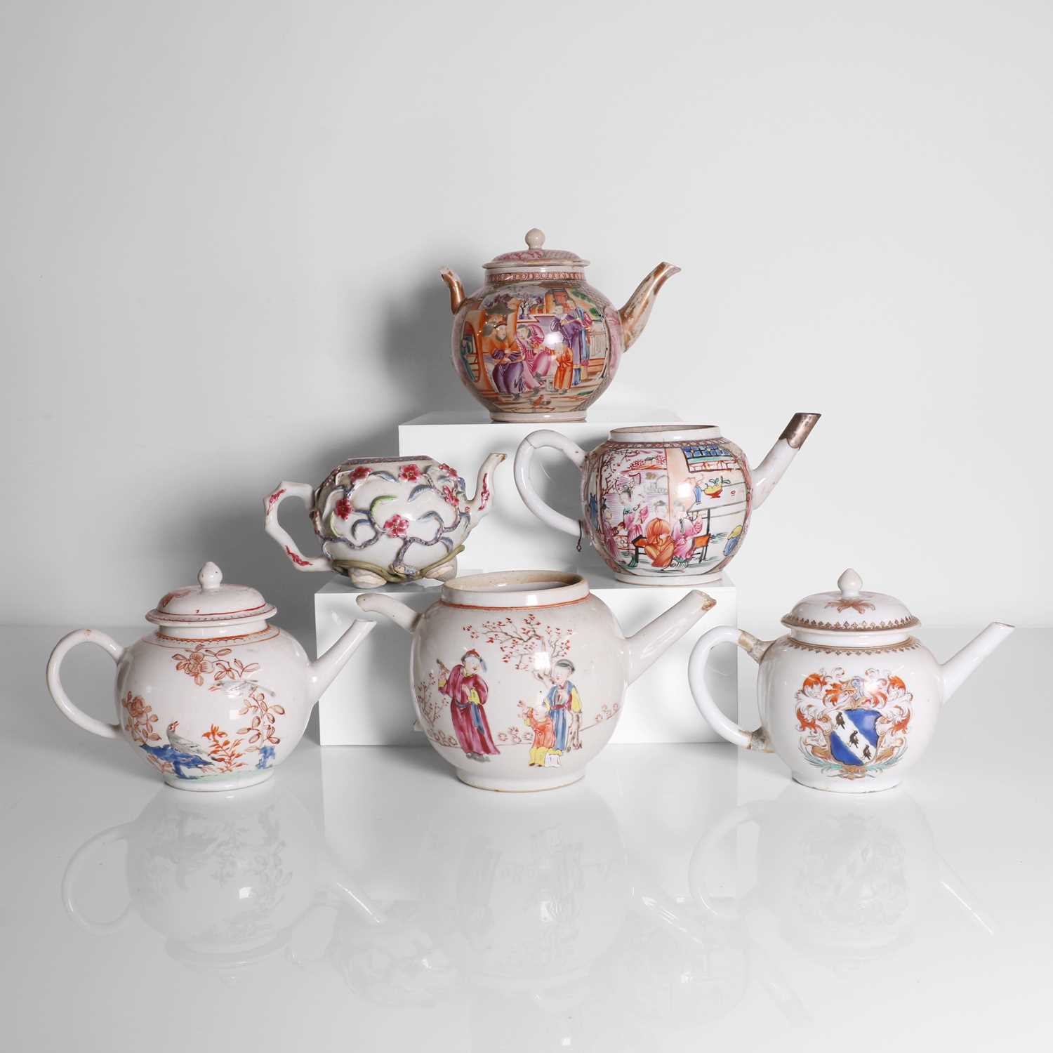 Lot 122 - A collection of six Chinese porcelain teapots