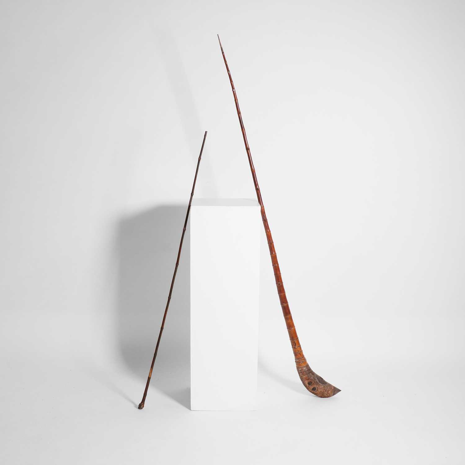 Lot 127 - Two bamboo opium pipes