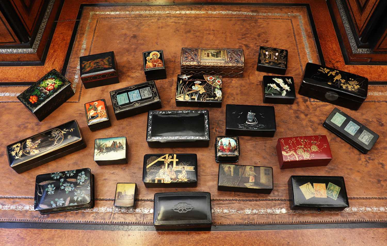 Lot 137 - A group of lacquered stamp boxes,