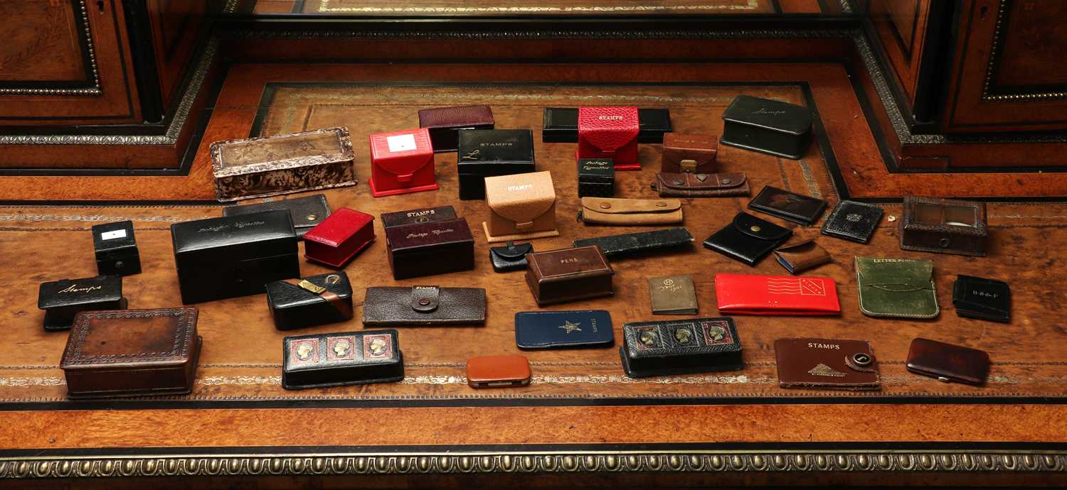 Lot 152 - A group of leather stamp boxes and books