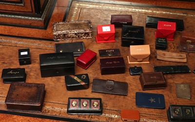 Lot 152 - A group of leather stamp boxes and books