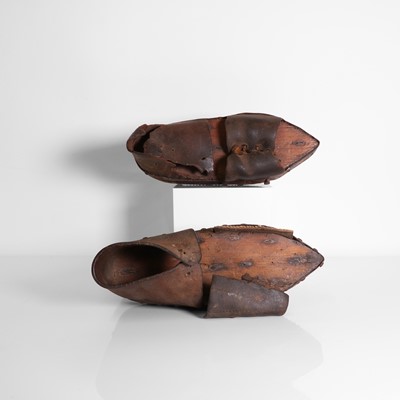 Lot 63 - A pair of chestnut-peeling shoes