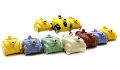 Lot 243 - A collection of Sadler art deco racing car teapots