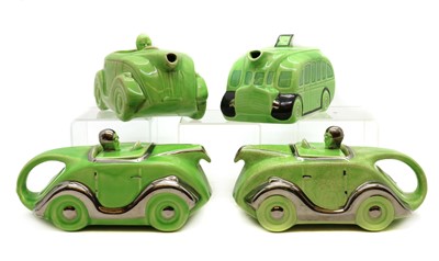 Lot 241 - A collection of three Sadler art deco racing car teapots