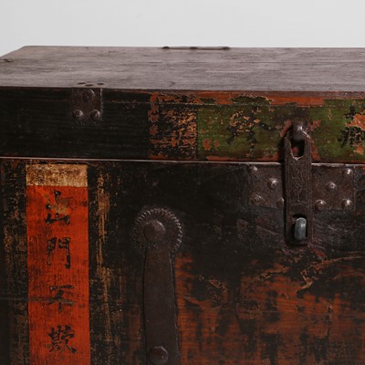 Lot 125 - A painted elm and iron-bound trunk
