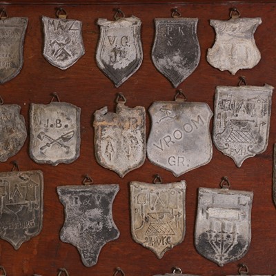 Lot 24 - A collection of forty lead-roof-slaters' lead trade plates