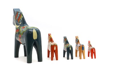 Lot 409 - A set of five Swedish painted 'Dala' horses