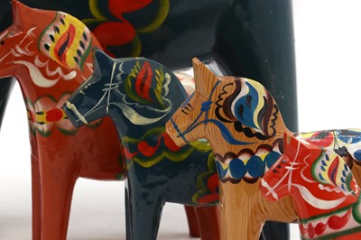 Lot 409 - A set of five Swedish painted 'Dala' horses